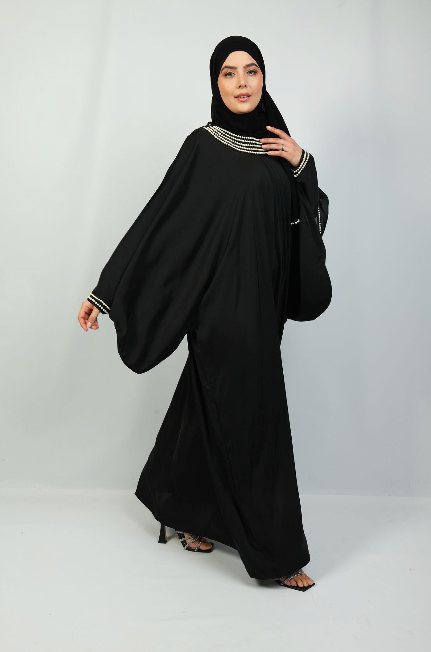 Abaya with Embellished Features and Flared Shape in black Abayas By Iqra