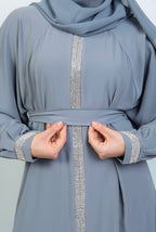 Abaya with Embellished Features and Flared Shape in grey Abayas By Iqra